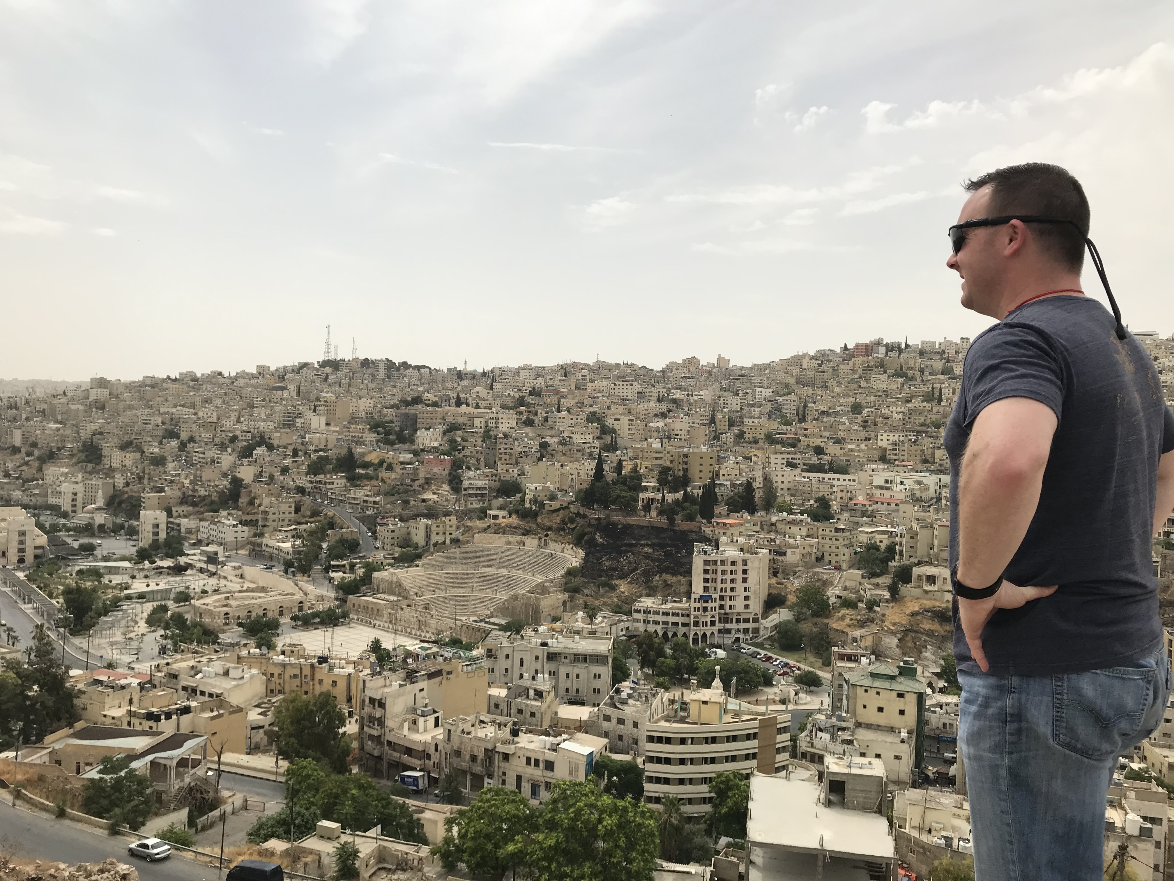 Sean looking out over Amman, Jordan from a hilltop